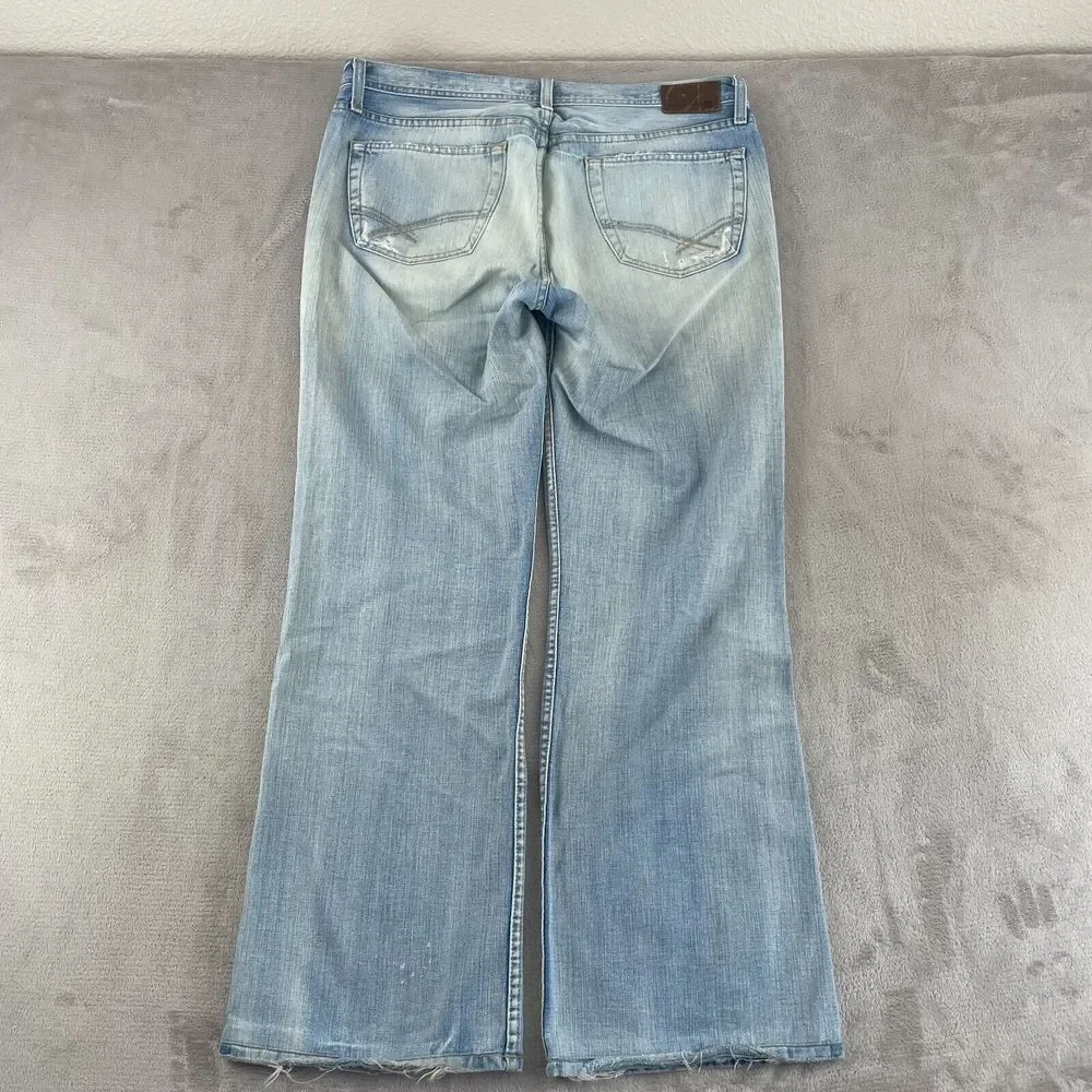 VTG BKE 67Jeans Buckle 36x33 Light Blue Wash Denim‎ Distressed Wide Leg Tyler